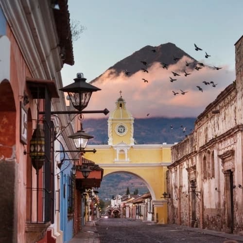 Antigua Guatemala with colonial streets and volcano backdrop