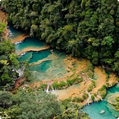 Turquoise pools of Semuc Champey surrounded by jungle